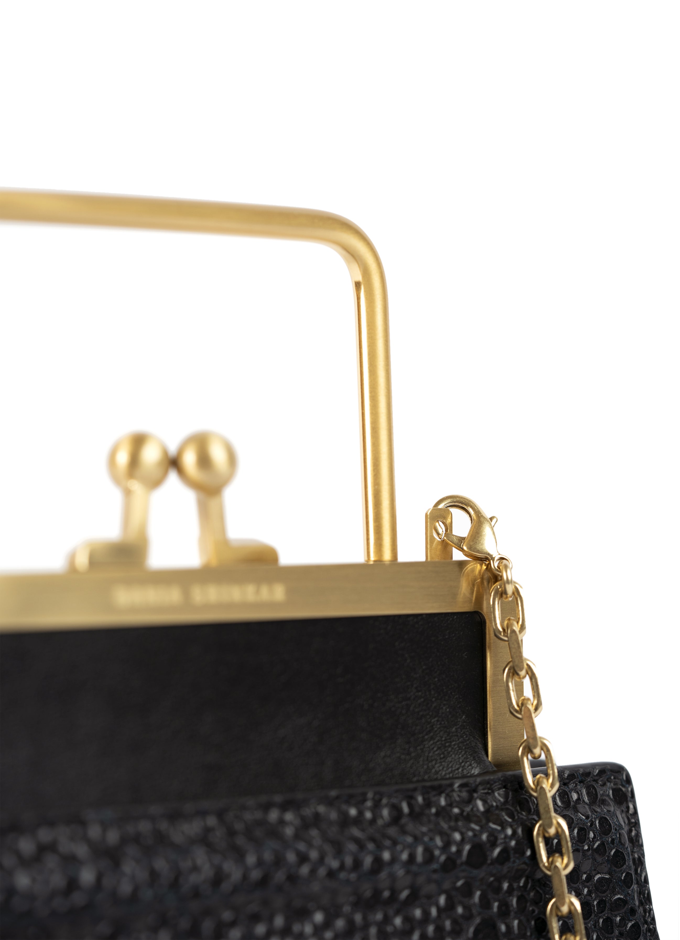 black-stingray-embossed-mini-bag-side-chain-detail